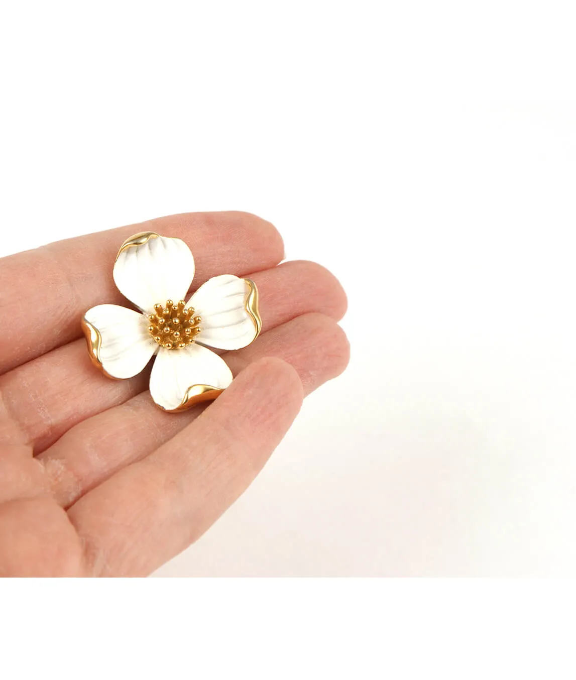 Trifari dogwood brooch in the hand