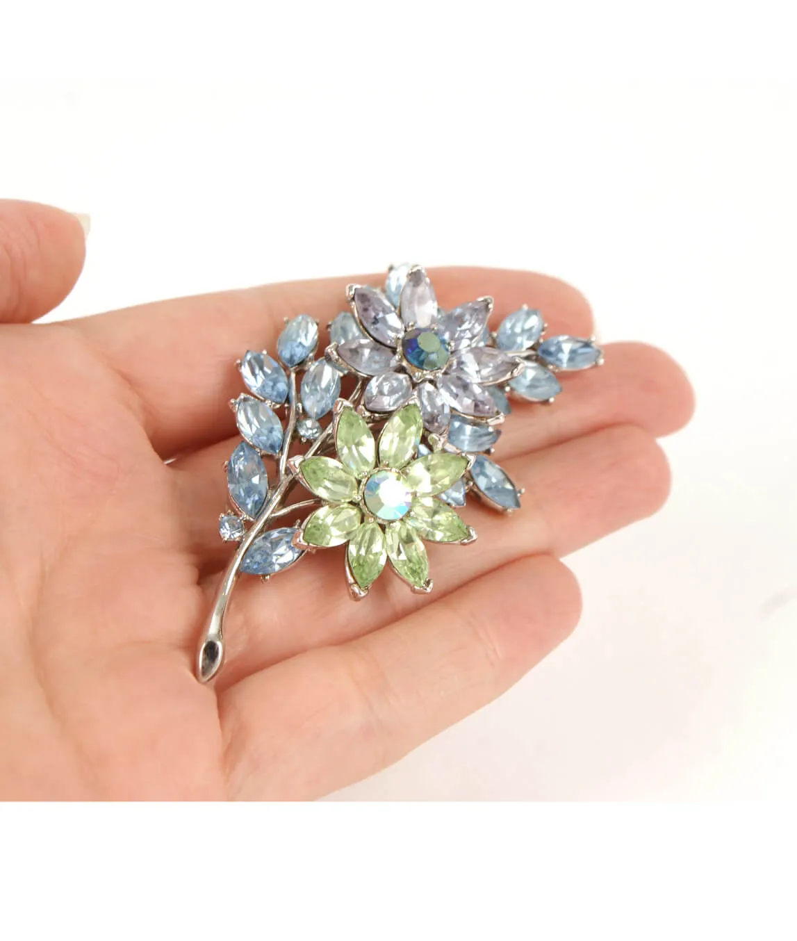 Trifari crystal brooch in the hand