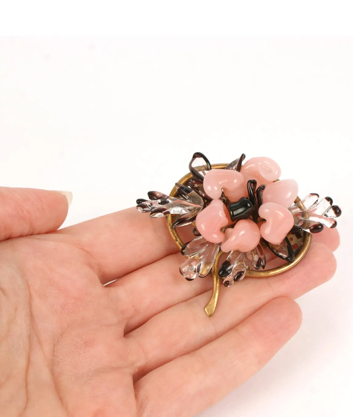 Rousselet brooch in the hand