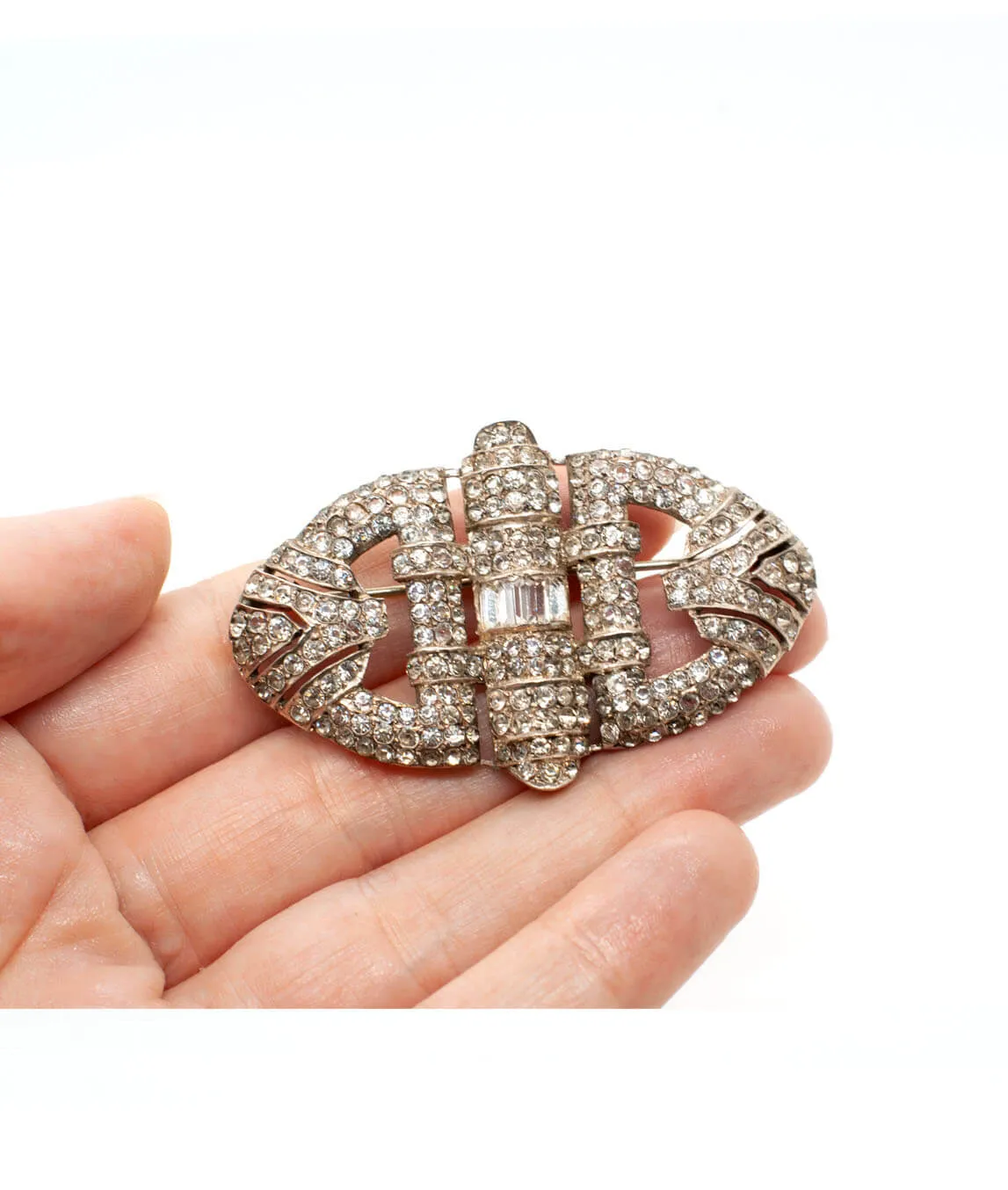 Art Deco brooch in the hand