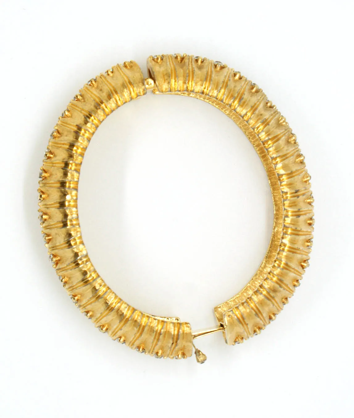 Gold plated bangle by Joseph Mazer
