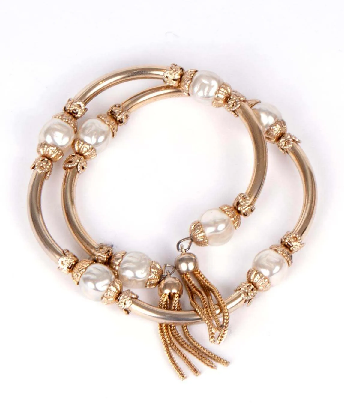 Early Miriam Haskell attributed baroque pearl and gold plated memory wire bracelet