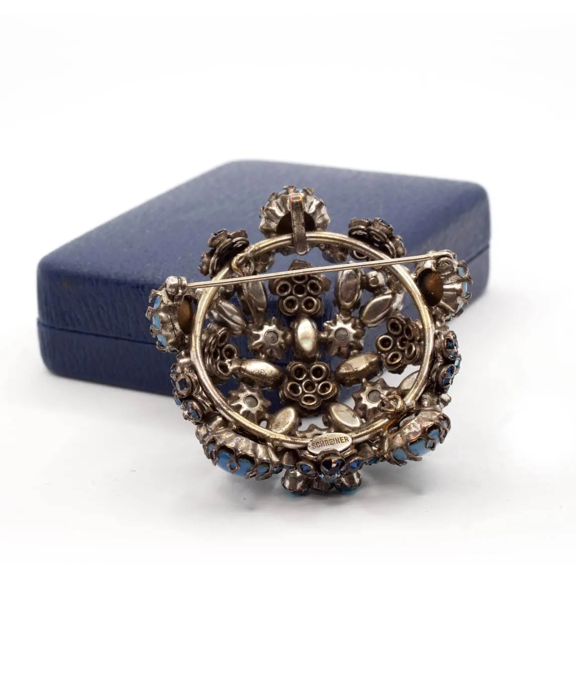 Large vintage brooch with the Schreiner plaque