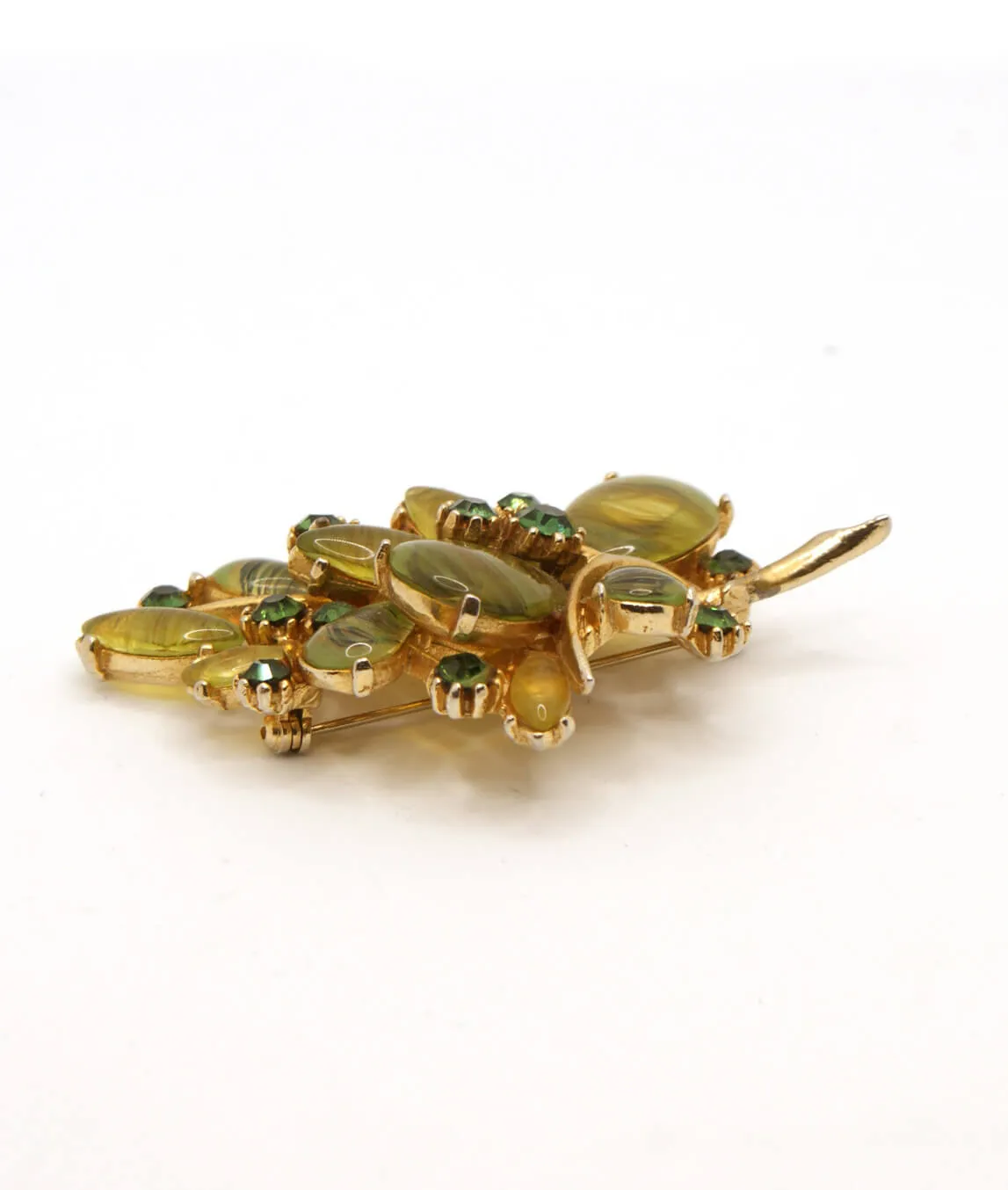 Vintage ART brooch with green stones side profile