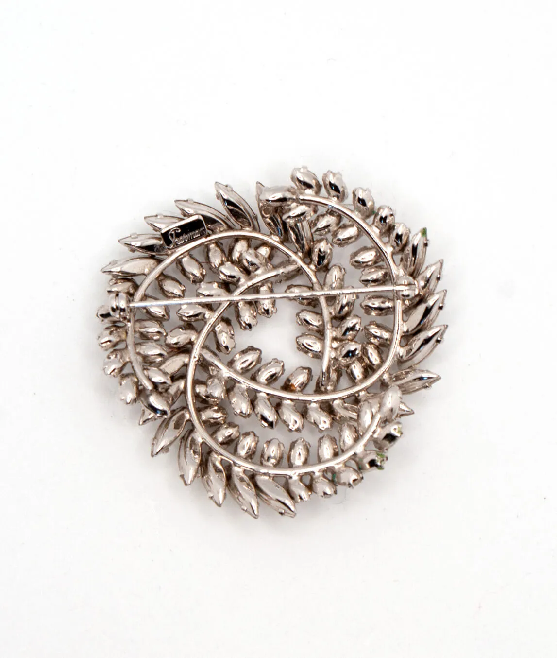 Rhodium plated backing of Sherman brooch