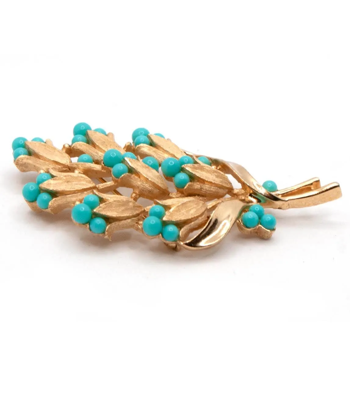 Vintage Trifari floral brooch in gold tone with turquoise beads side view