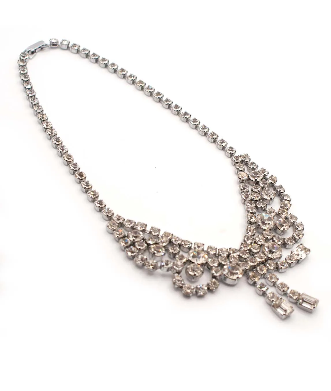 Draped clear rhinestone crystal festoon necklace on silver metal 