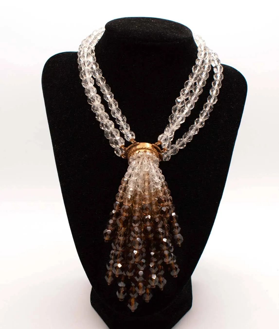 Coppola e Toppo 1950s clear and brown tassel necklace on mannequin