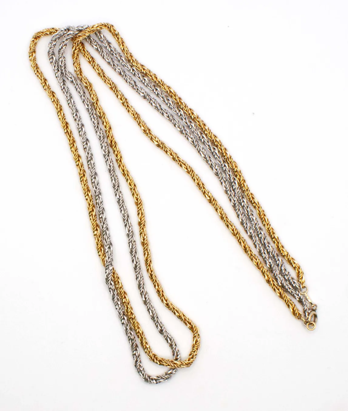 Two strand long rope chain in silver and gold by Grossé