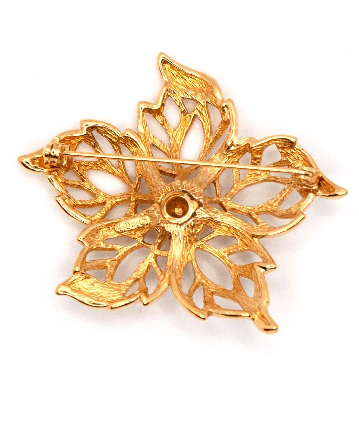 Rear view of a gold plated Christian Dior vintage brooch pin
