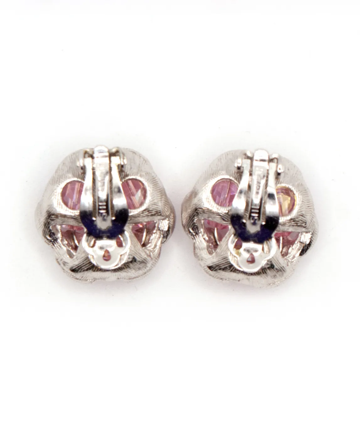 Back of vintage clip on earrings silver tone with pink visible