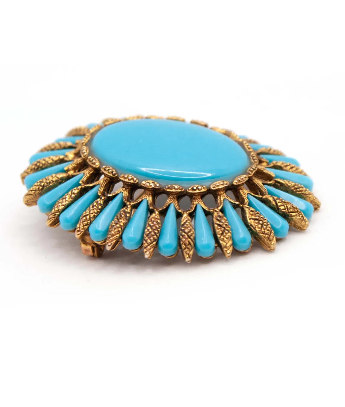 Vintage oval shaped turquoise glass brooch by HAR side view