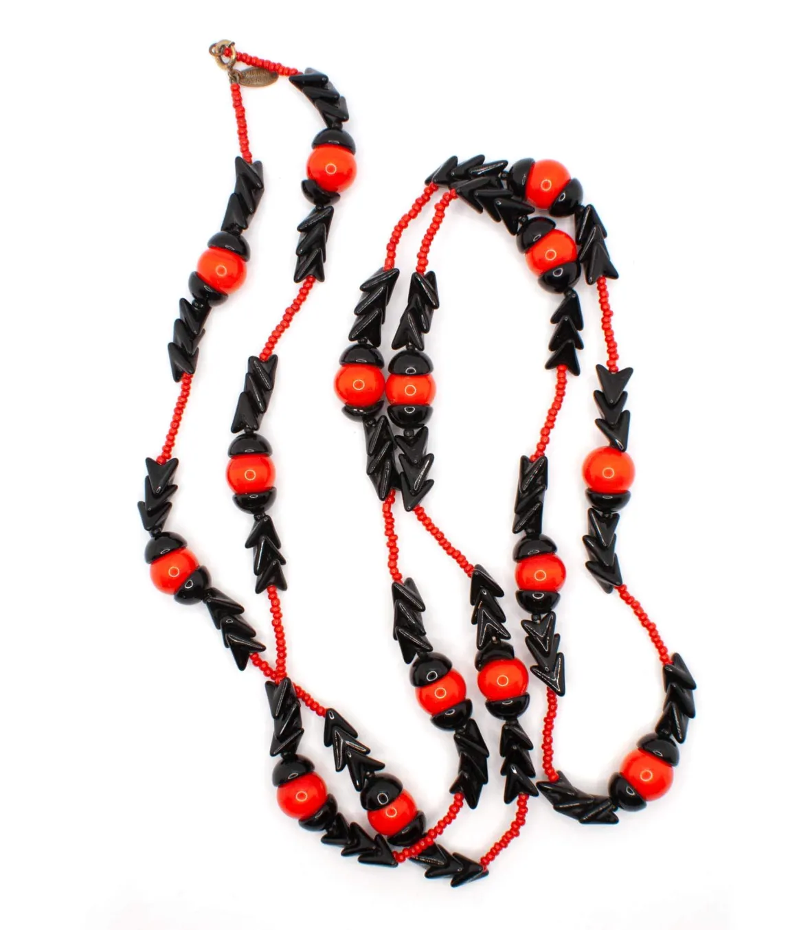 Long beaded necklace by Miriam Haskell with red and black chevron beads