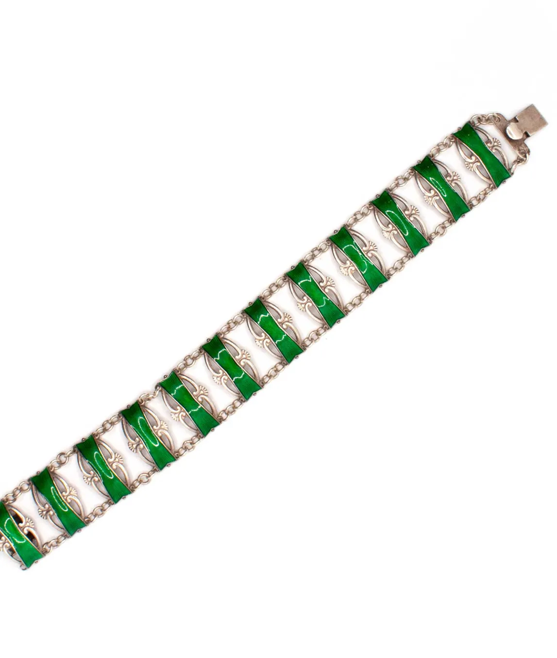 Emerald green enamel on sterling silver vintage bracelet laying flat and straight