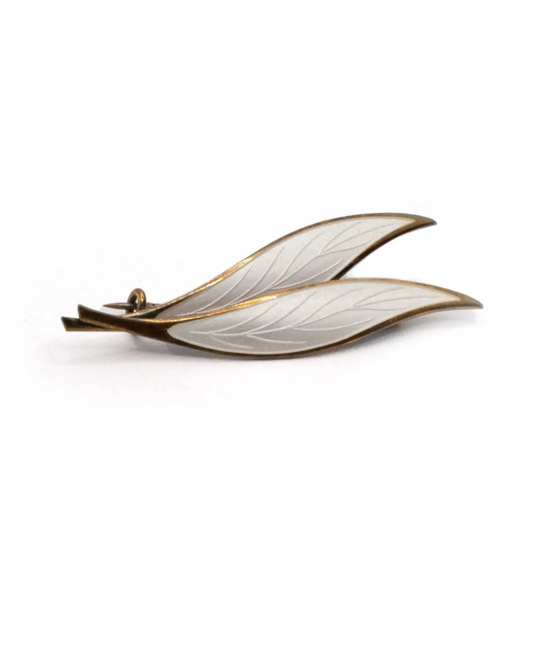 Double leaf brooch decorated with white enamel with a gold plated perimeter and stems side view