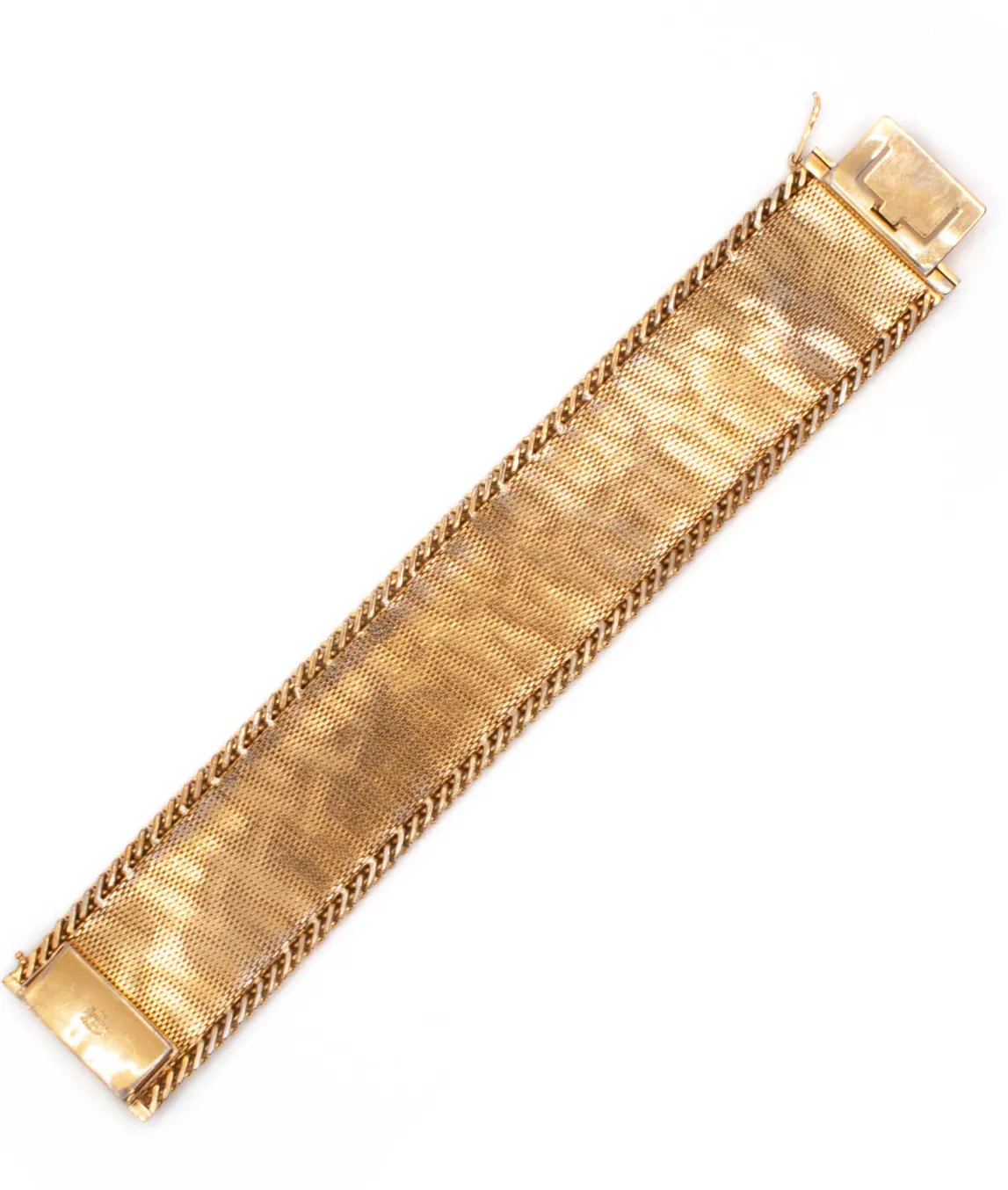 Interior of woven gold plated bracelet by Grosse