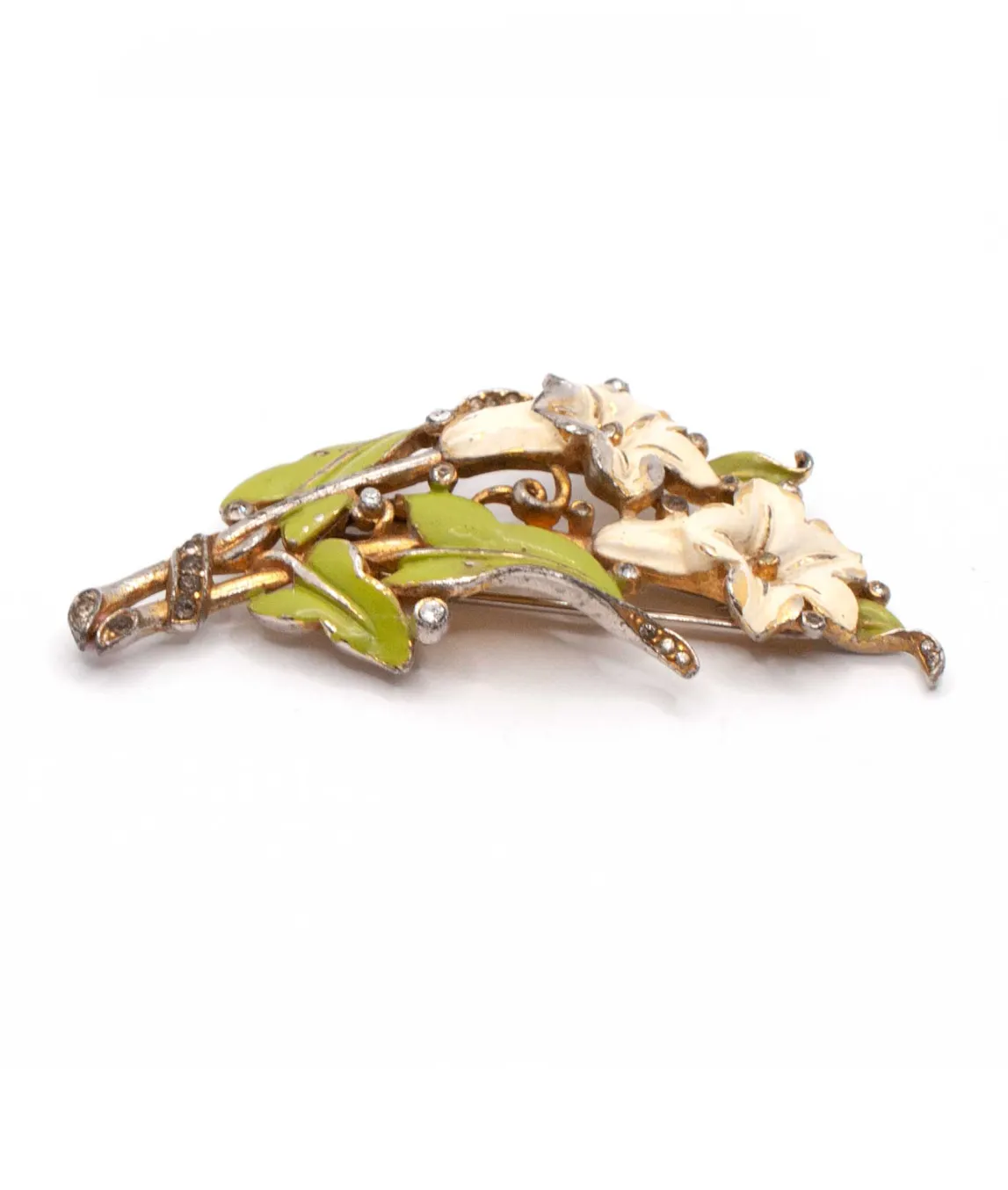 Trifari enamel brooch with green leaves and two ivory flowers side view