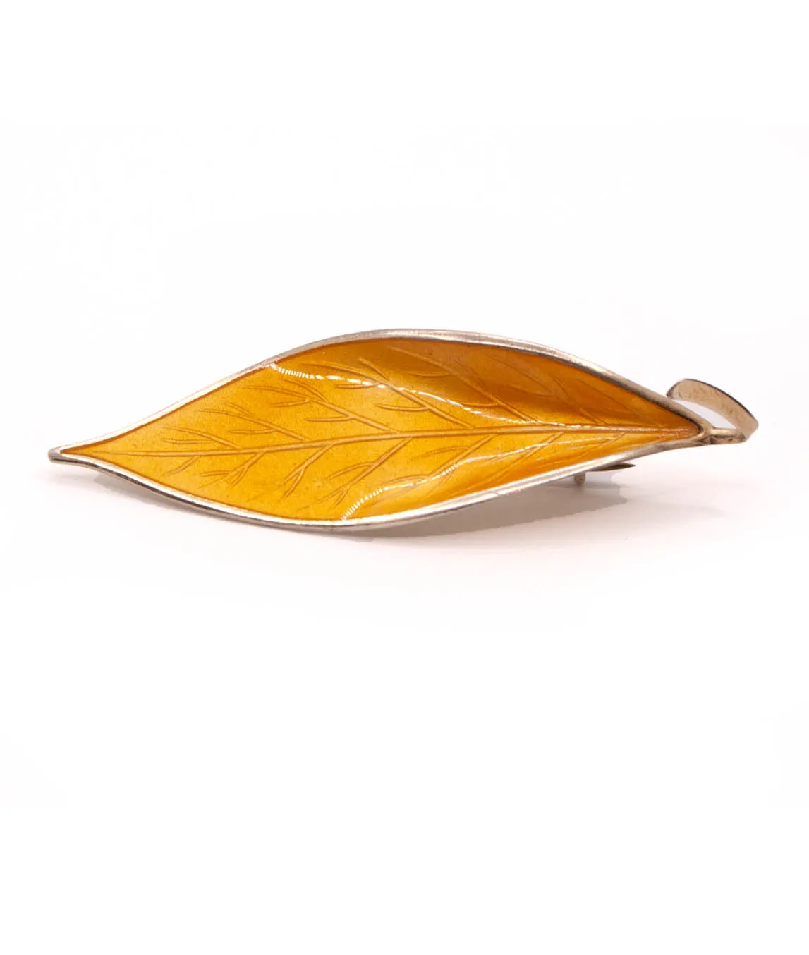 Yellow enamel on silver leaf brooch by David Andersen