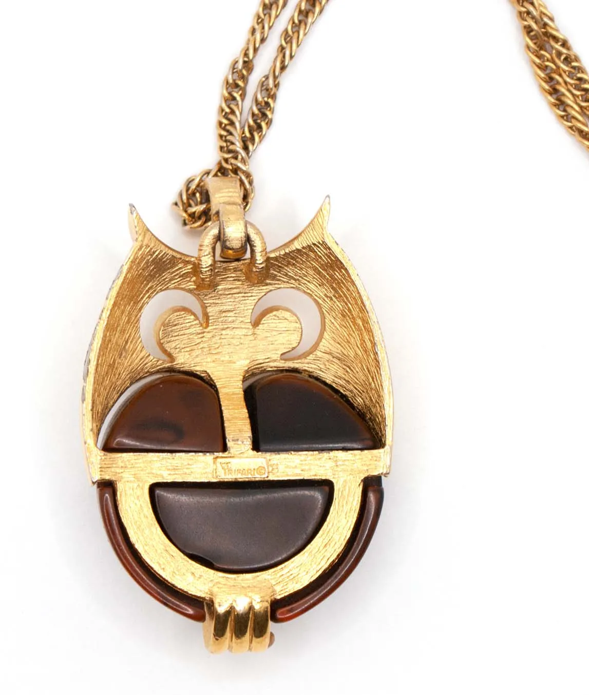 Back of Trifari owl pendant showing Crown Trifari stamp