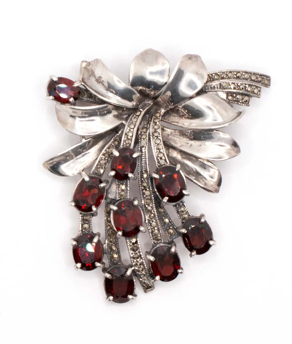 Silver and marcasite brooch with garnet red paste stones