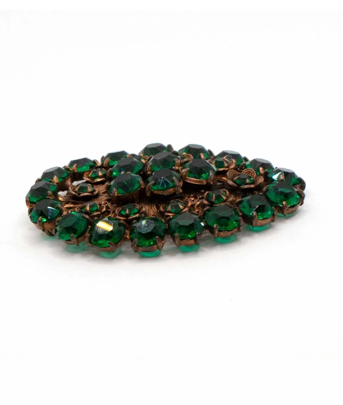 Dress clip set with dark emerald green glass crystals side view
