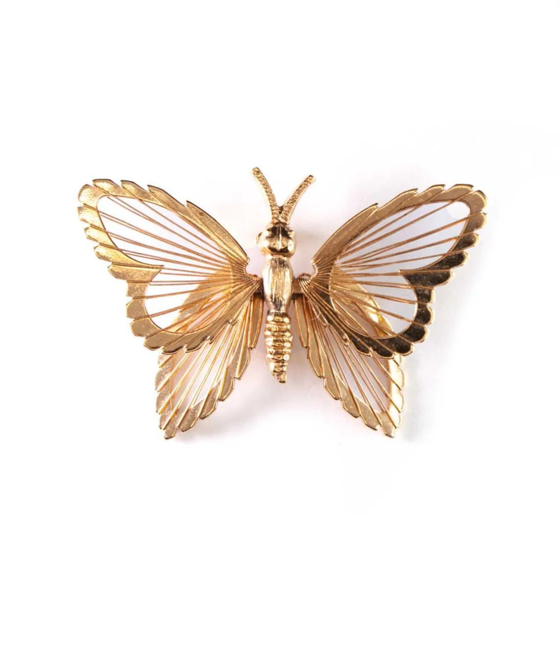 Top view of gold tone wire butterfly brooch by Monet