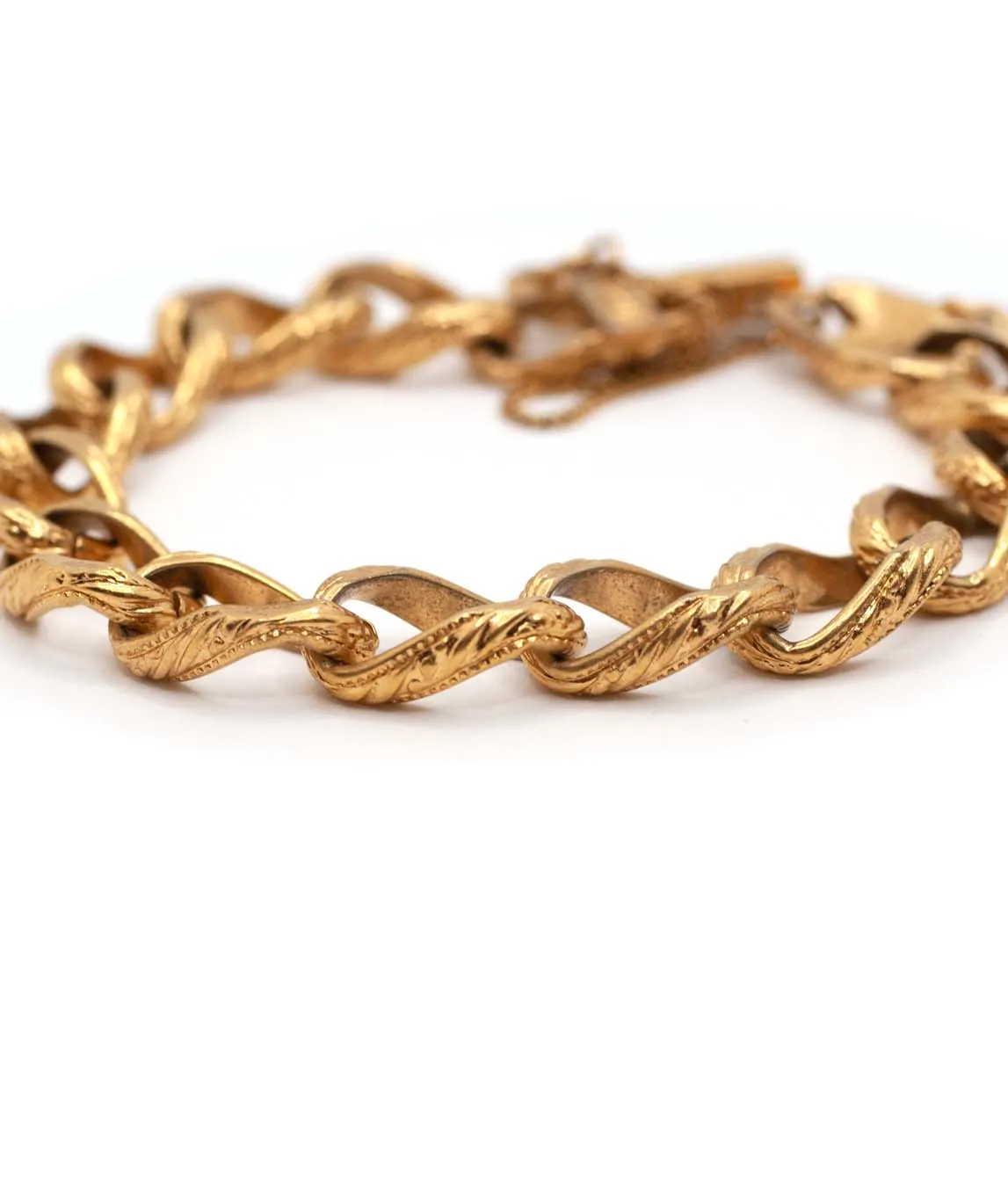 Close up of gold plated textured links of vintage Monet bracelet