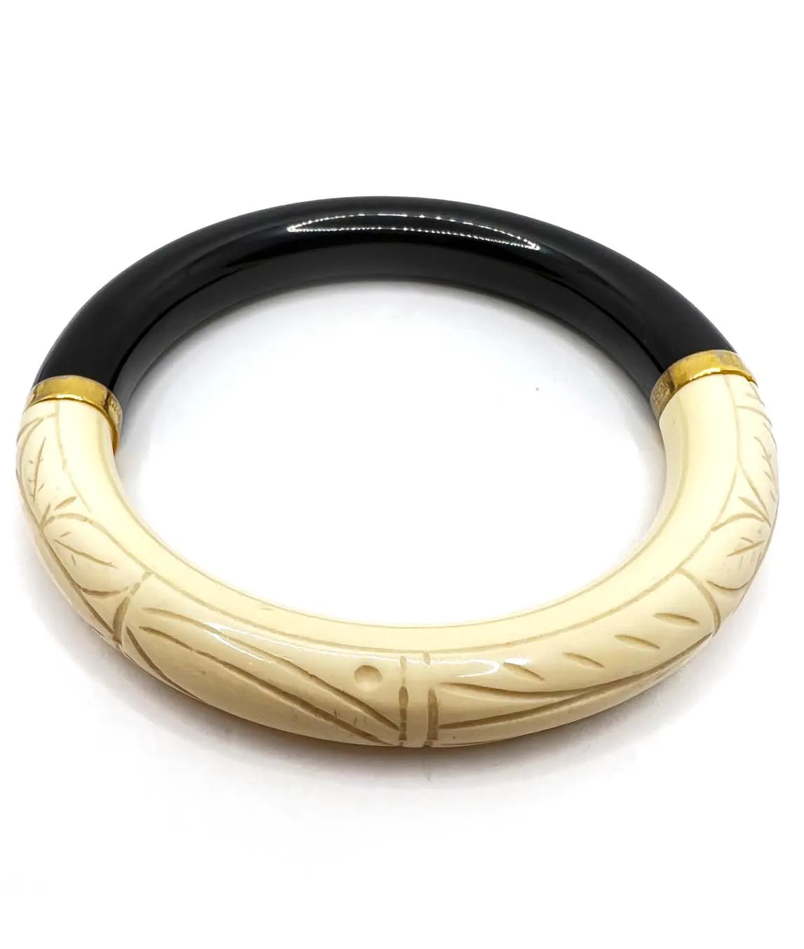 Carved plastic bangle bracelet by Givenchy ivory and black in colour