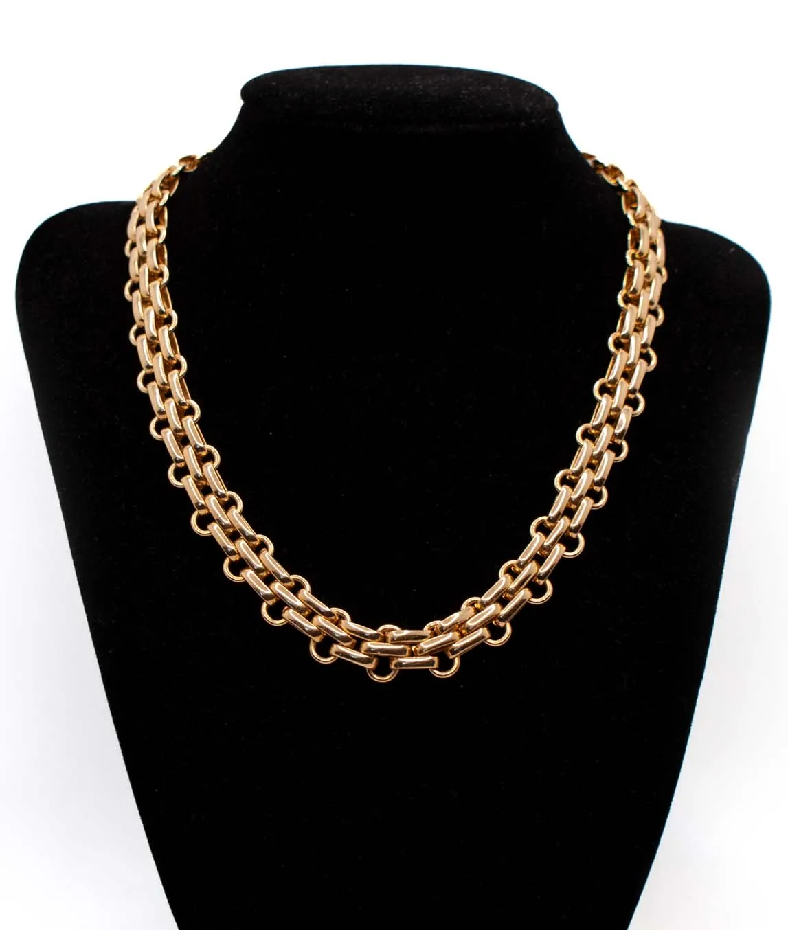 Christian Dior chunky fancy link gold plated chain necklace on black display bust