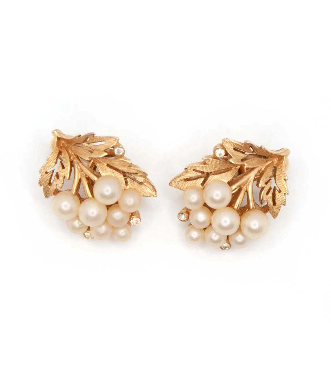 Crown Trifari textured gold plated earrings with faux pearls and rhinestones top view