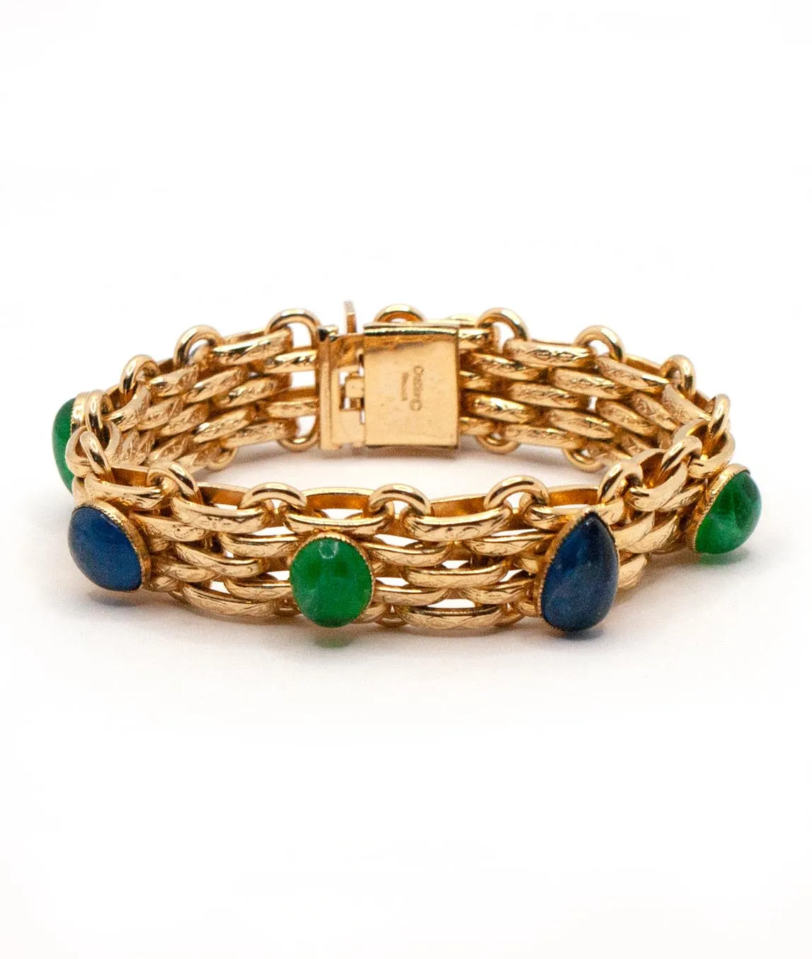 Gold plated bracelet with green and blue poured glass gems by Christian Dior