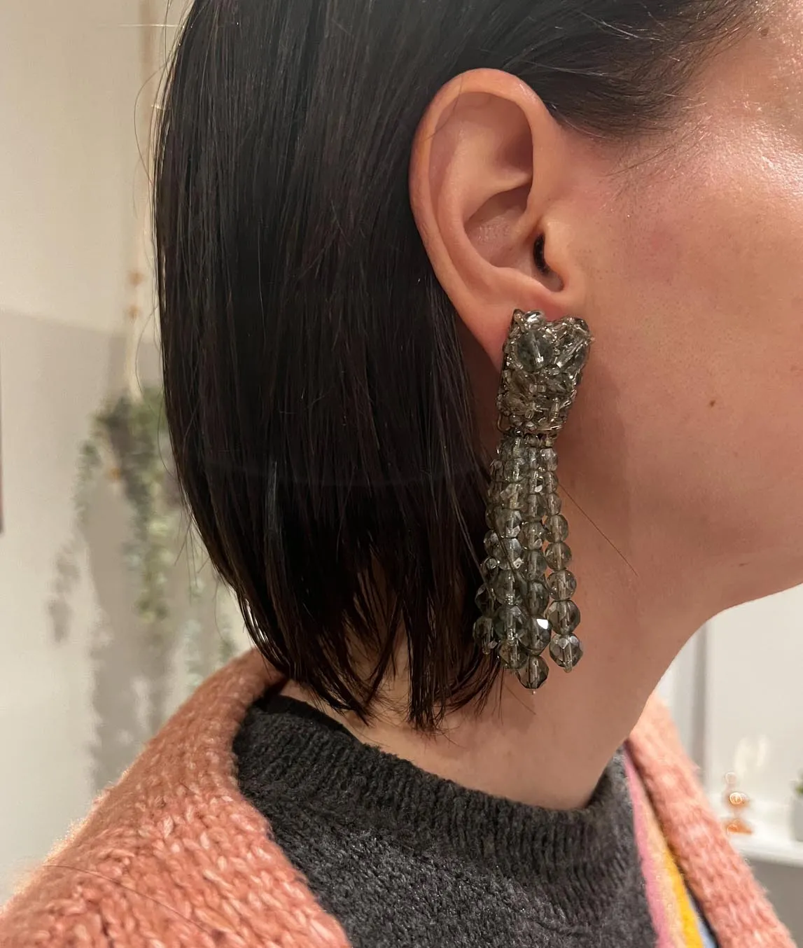 Long grey beaded earring by Coppola e Toppo worn by model