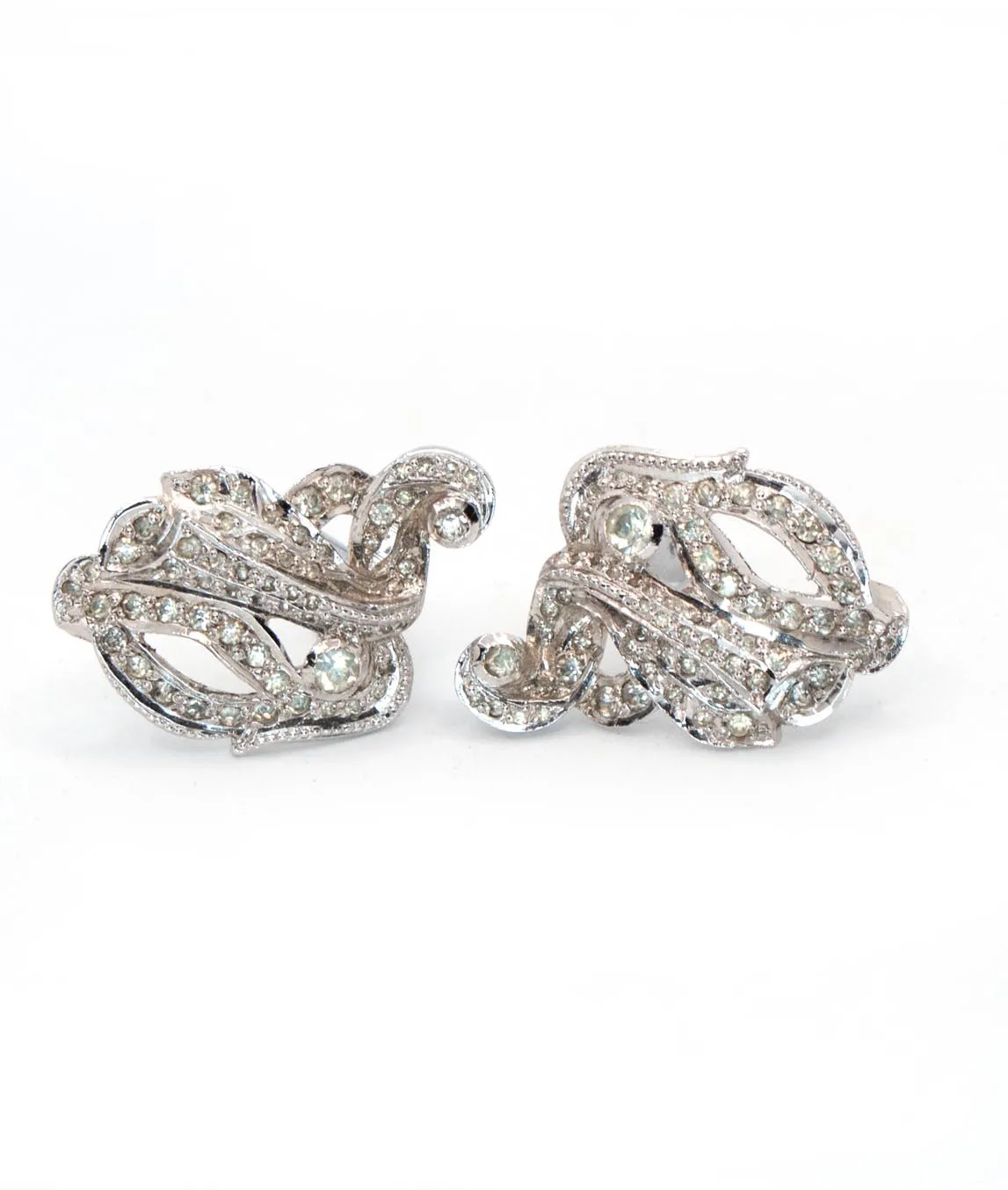 Two dress clips with clear crystals and rhodium plated metal