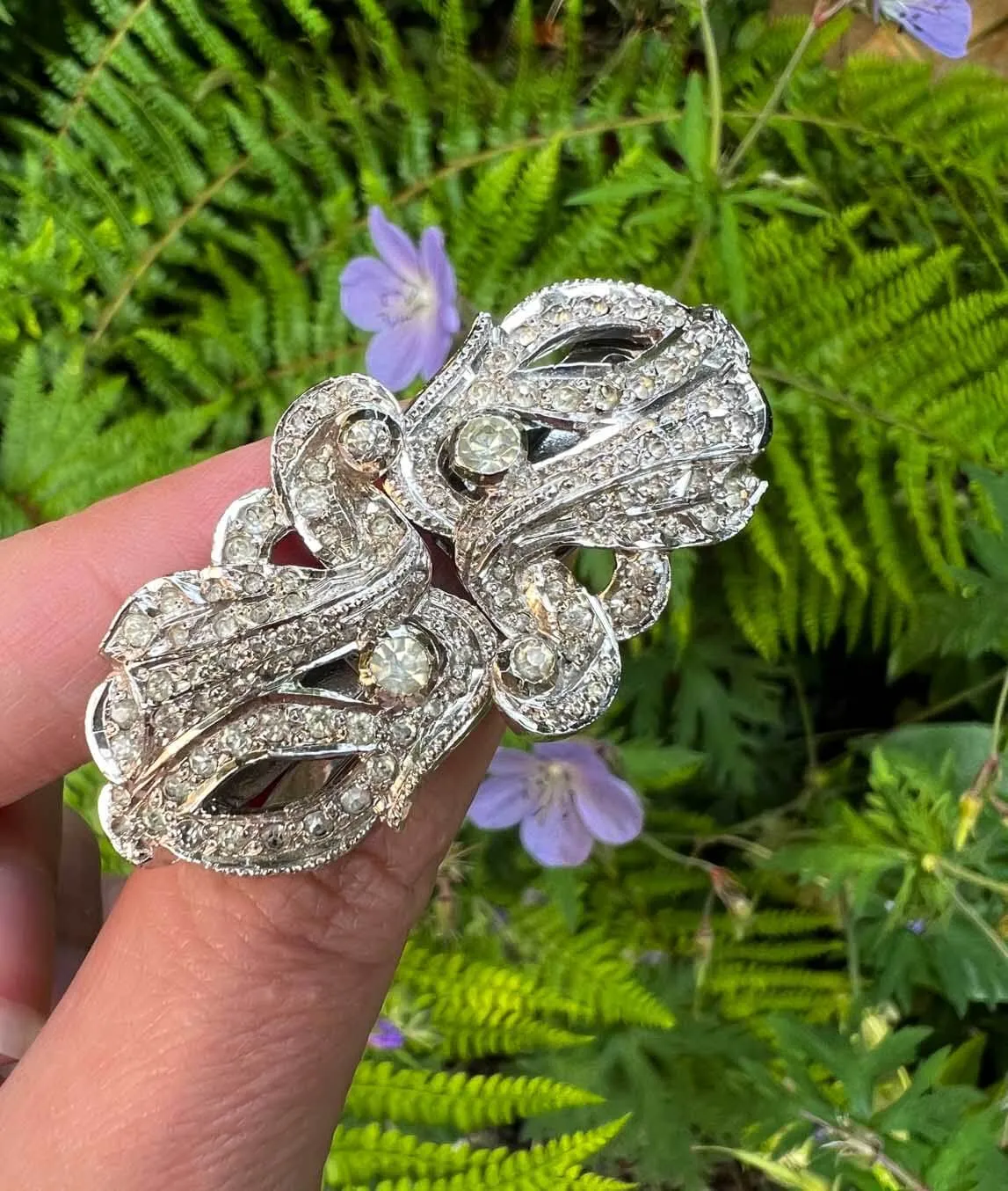 Art Deco double dress clip clear pastes on white metal outside with green leaves and purple flowers