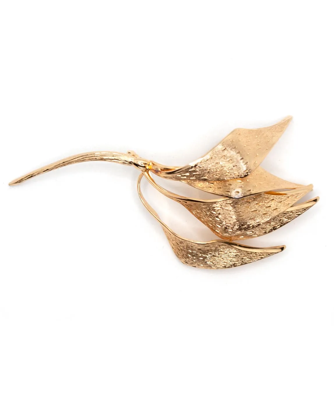 Gold-plated multi-leaf brooch by Henkel and Grosse with textured metal leaves top view