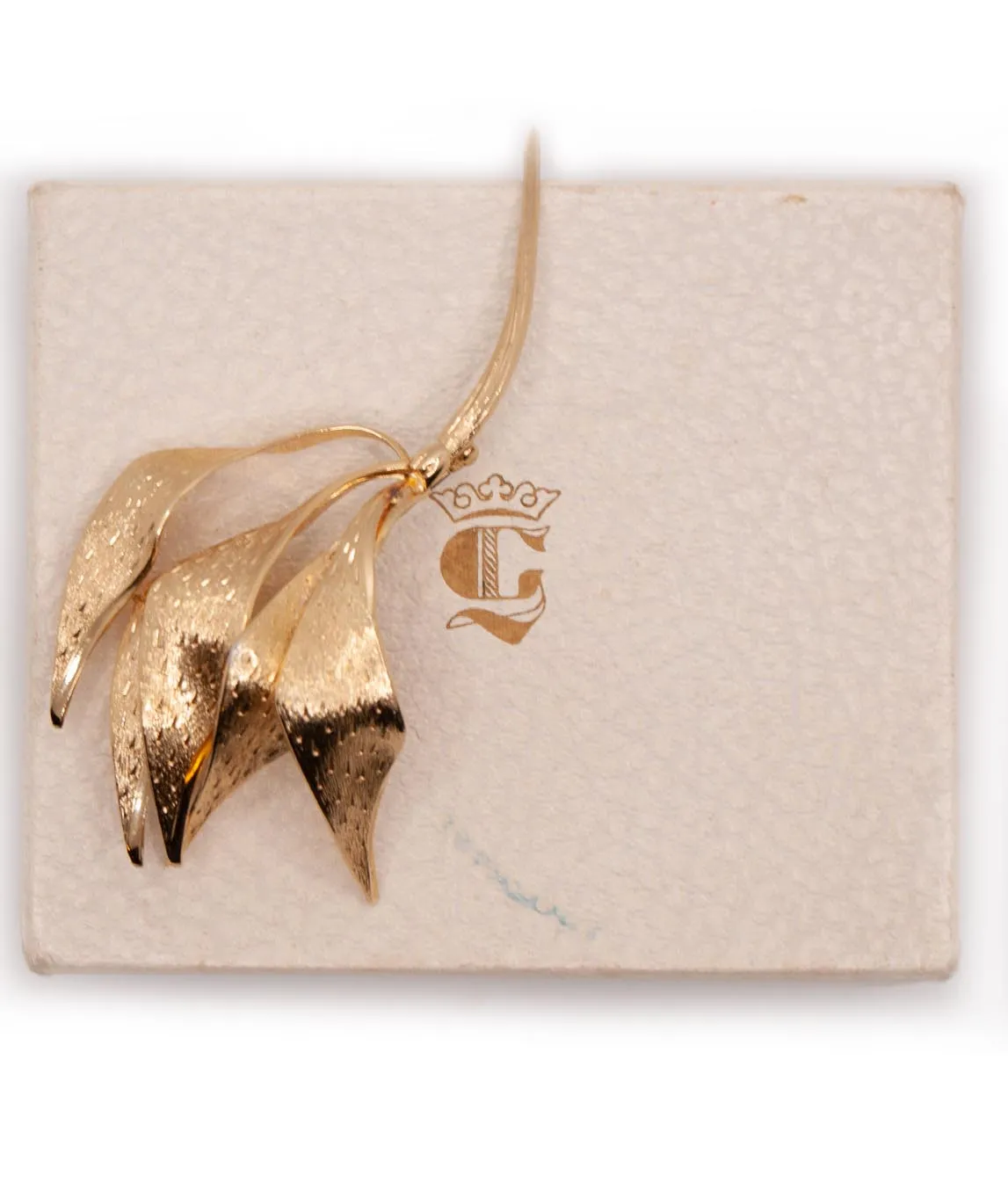 Gold-plated multi-leaf brooch by Henkel and Grosse with textured metal leaves with box
