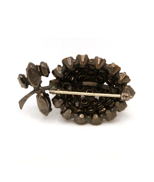 Schreiner berry brooch backing with japanned metal and signature plaque