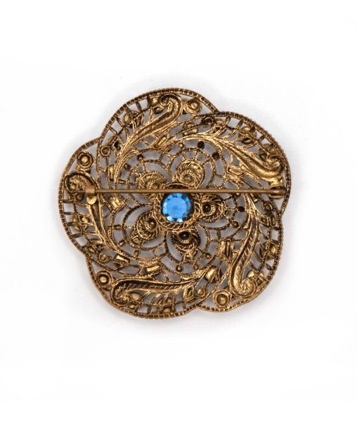 Back of pressed brass Czech brooch with c-clasp