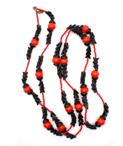 Long beaded necklace by Miriam Haskell with red and black chevron beads