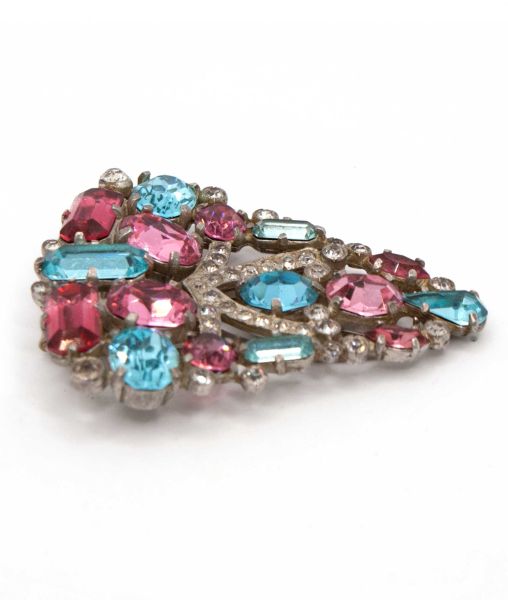 Large shield shaped fur clip by Eisenberg Original set with large pink and blue paste gems side view