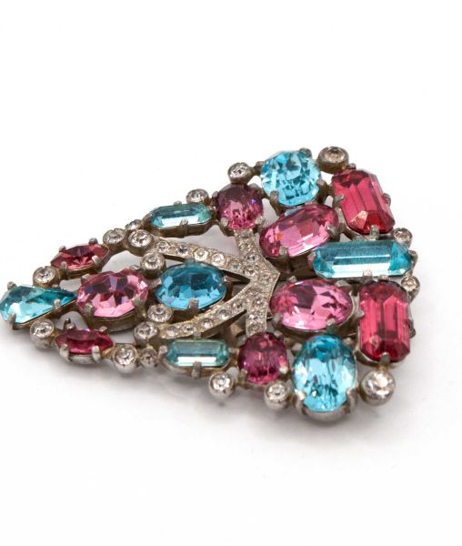 Large shield shaped fur clip by Eisenberg Original set with large pink and blue paste gems profile view